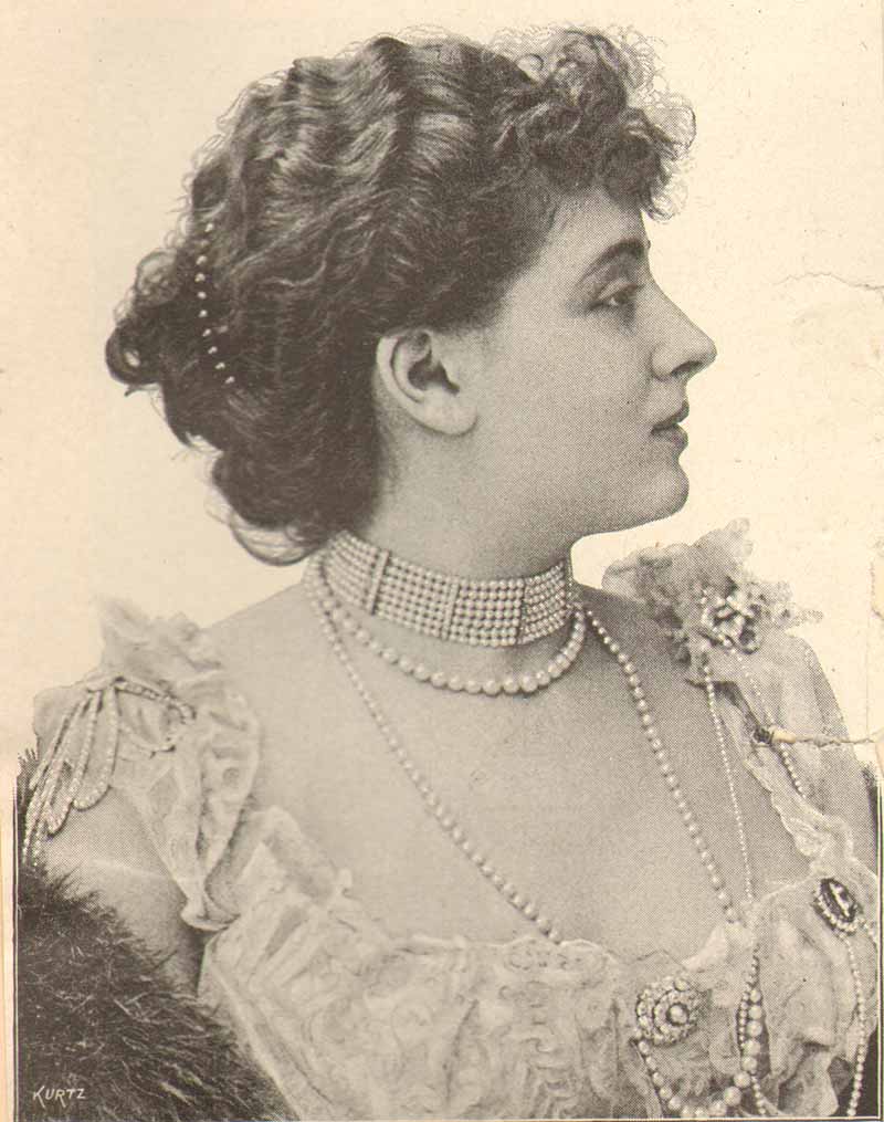 actress with pearls and waved hair