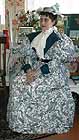 1895 day dress, linen printed with a lily pattern, worn by Katy, reproduction fabric by Burrows & co.